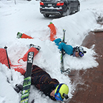 Abbie and I falling over a snowbank