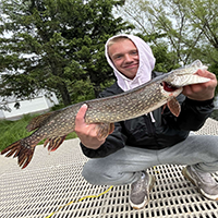 me holding a fish